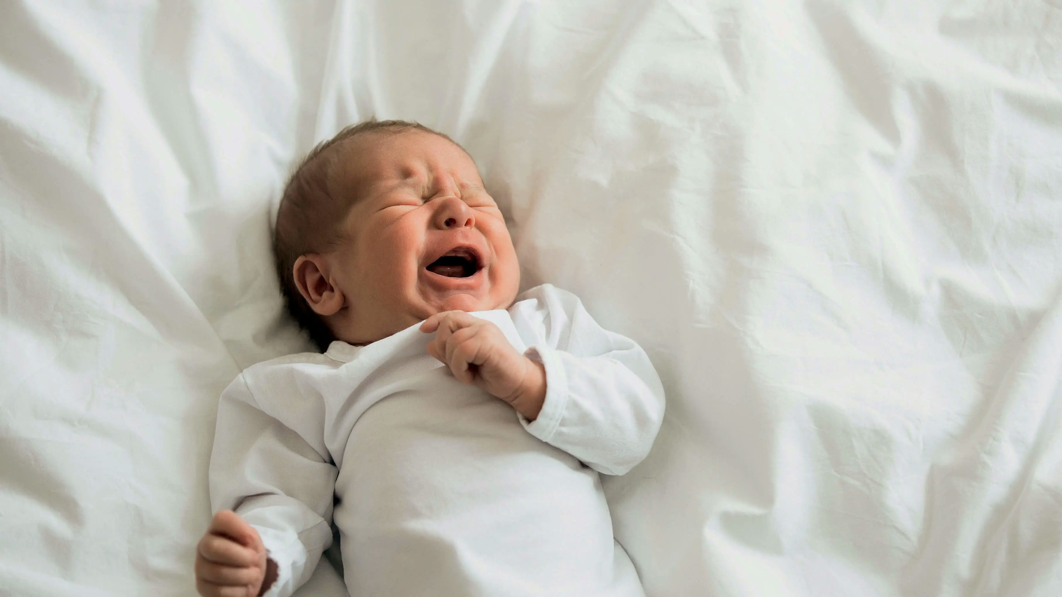 Image for Baby cries in their sleep - common causes and tips