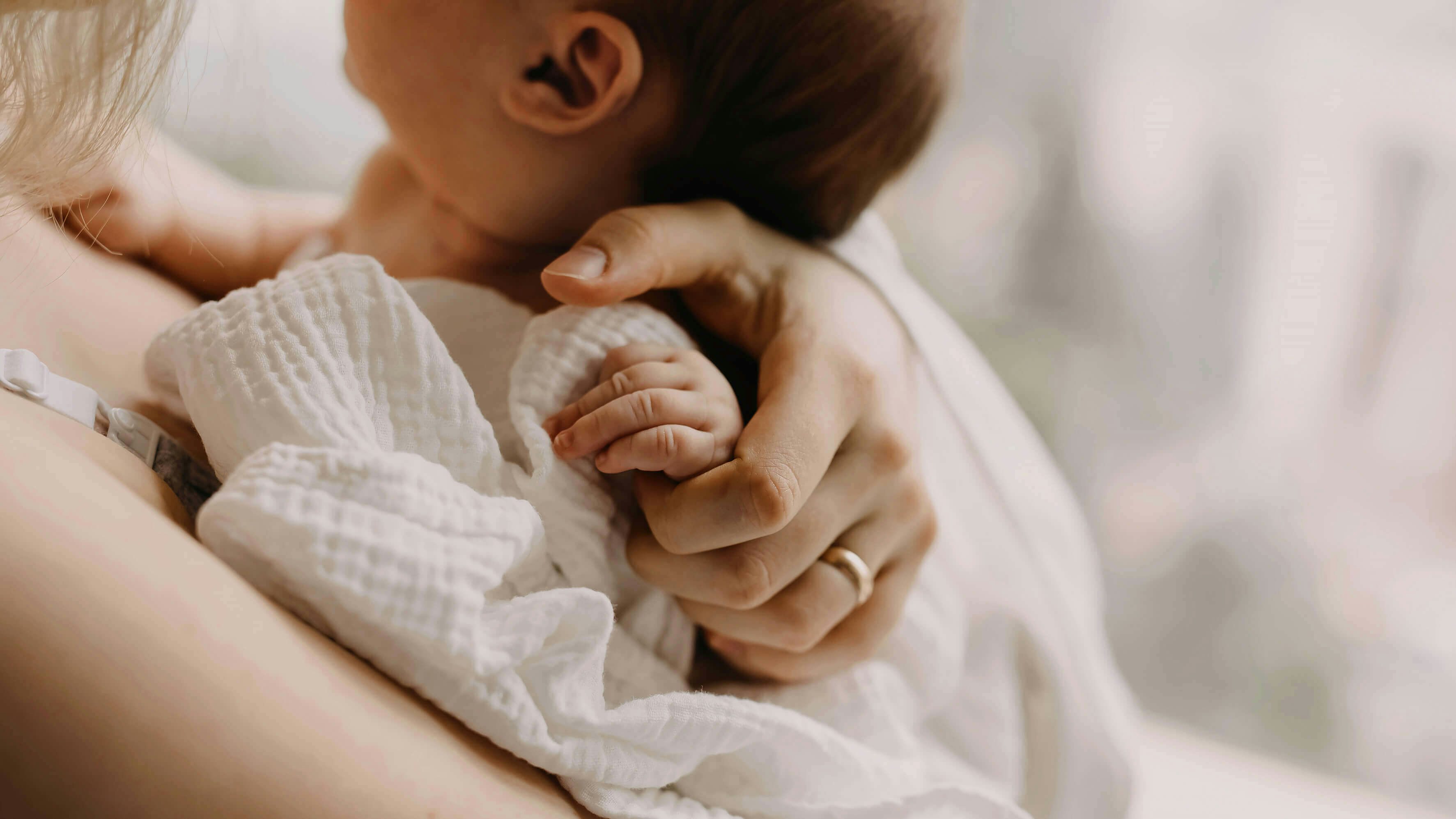 baby in mothers arms